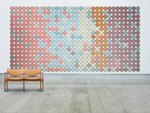 Round BAUX wood wool acoustic tiles in several colours.