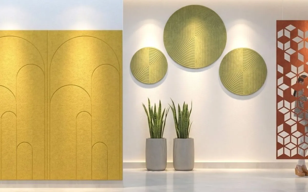 DROMEAS acoustic wall panels in yellow, green and orange felt.