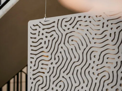 SPÄH divider air with rounded frame and nature pattern.